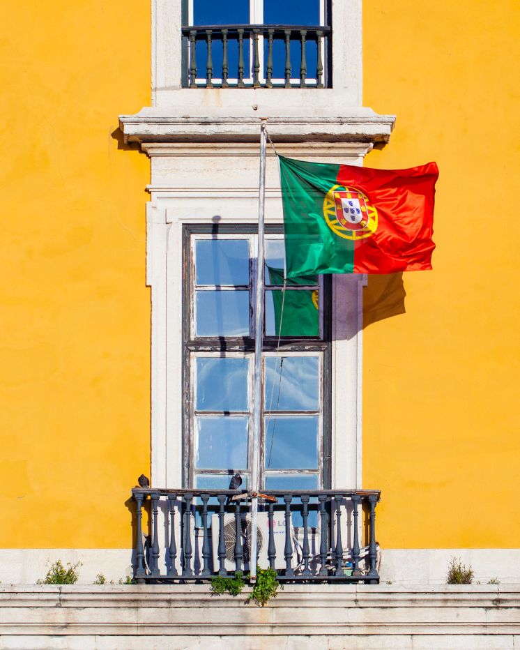 Portugal window with flag wind